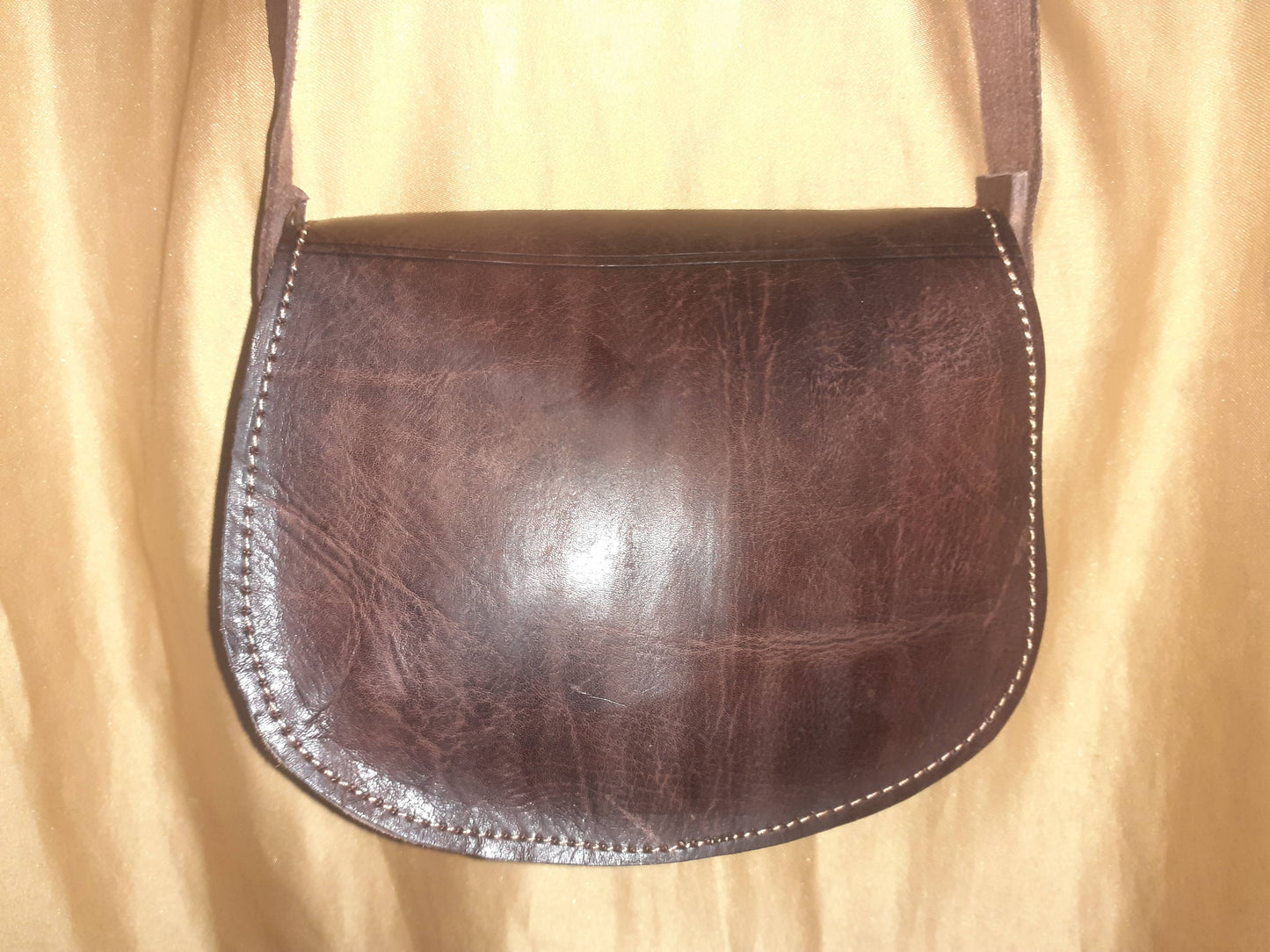 Bolso redondo calado/labrado mini