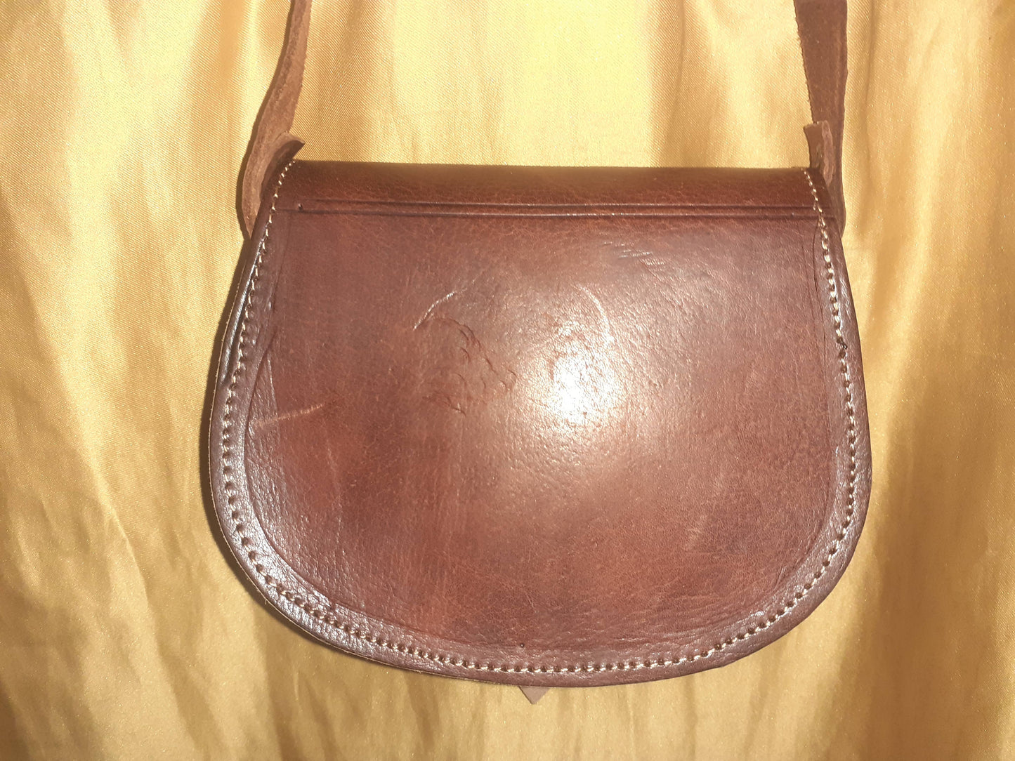 Bolso redondo calado/labrado mini