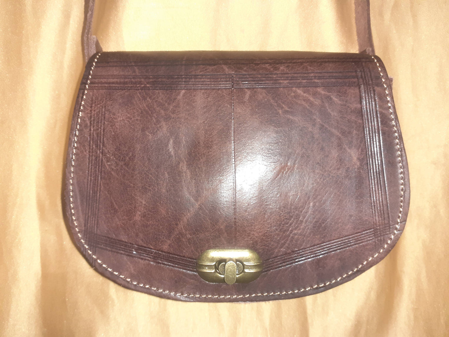 Bolso redondo calado/labrado mini